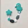 teal seahorse teething clip made from silicone