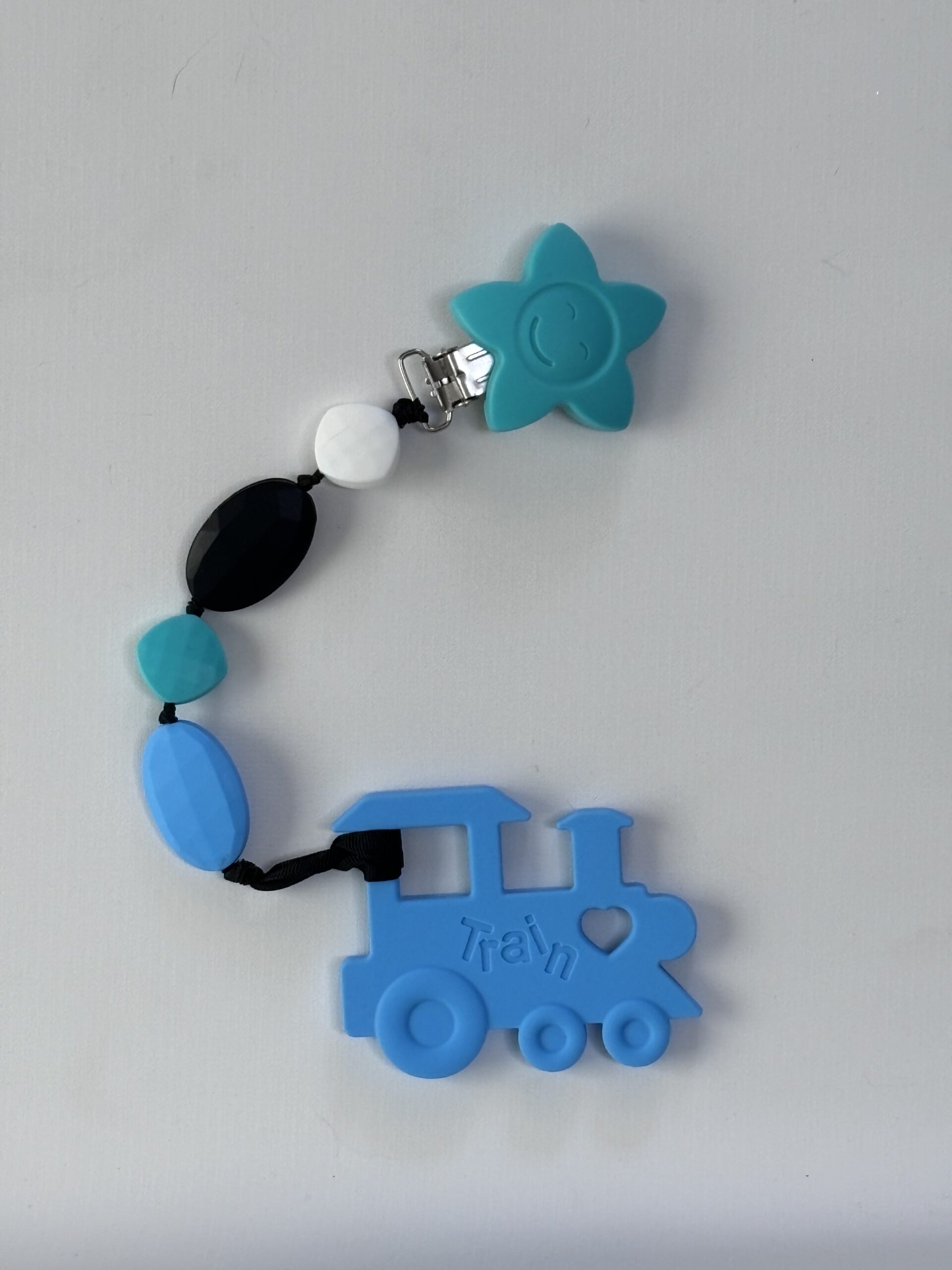 blue train teething clip
