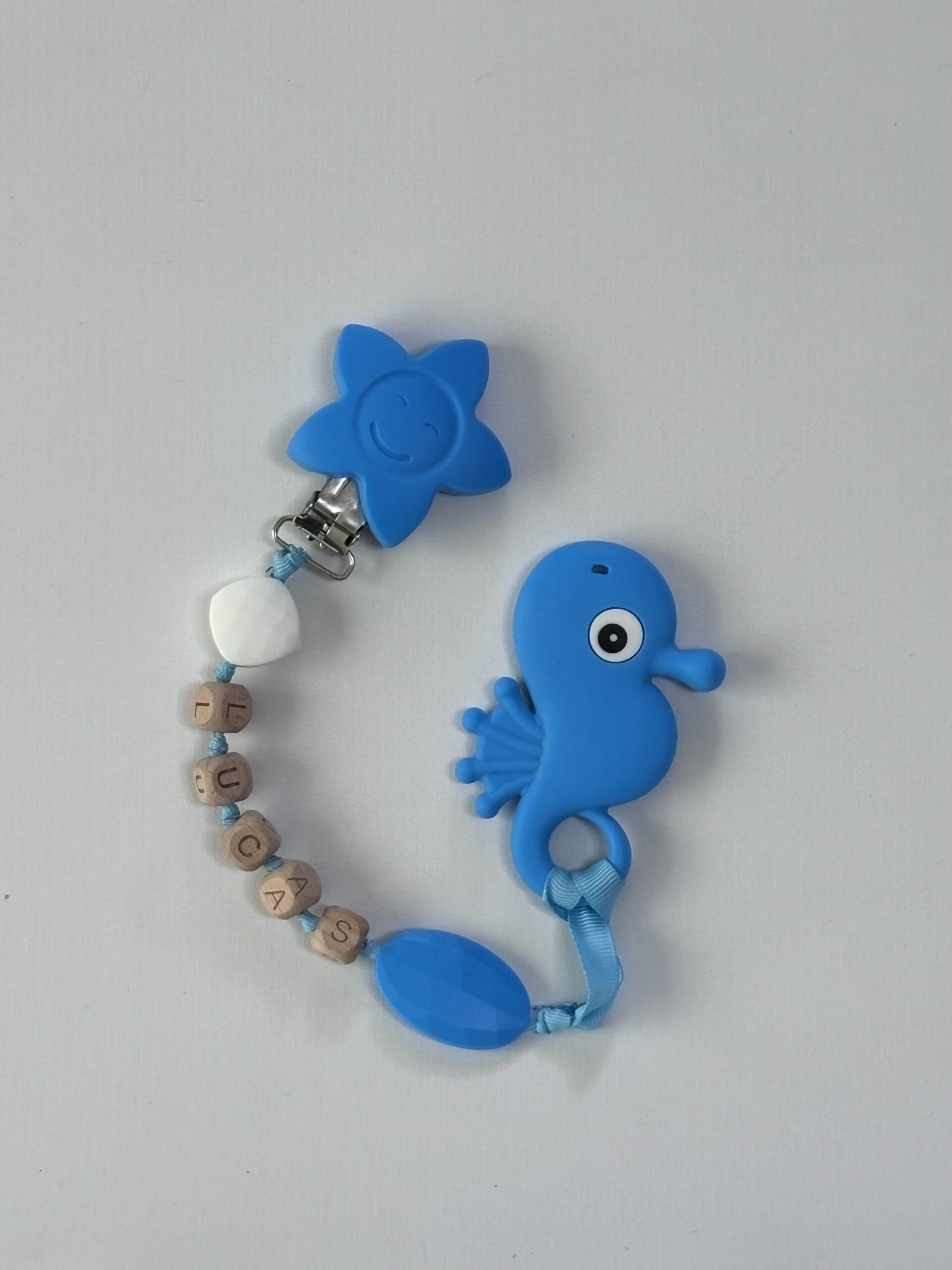 Blue personalized wooden letter seahorse teething clip