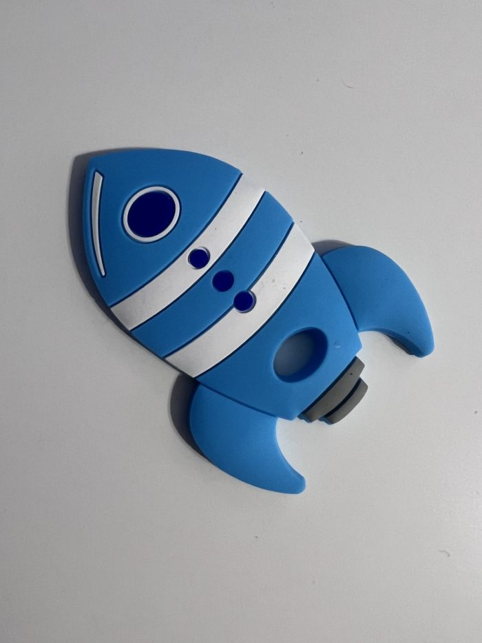 blue rocketship teething pendant